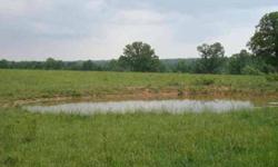 Nice tract of land. 103 acres m/l in a mixture of woods and pasture. All perimeter fenced with 2 nice ponds. This land is located just outside of town a few miles and has county road frontage. Some nice pasture land and also woods for good hunting. Just a