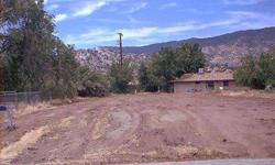 This R-2 lot is almost 1/4 acre in size and located a couple of blocks from the Kern Valley Plaza shopping center. Also close to schools K - 12 and Cerro Coso College. Build a single family home; put in a duplex for added income; develop the property