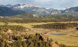 One of the finest trophy ranches in the State of Colorado, the Little Papoose Ranch is exceptional from the grandest of settings to the smallest detail. Set upon a knoll-top framing panoramic views spanning two breataking mountain ranges, considered by