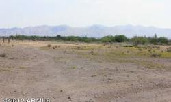 This is a perfect flat buildable lot. No washes. Underground power is right on Dove Valley Road contiguous to lot on the north side. Lot is part of upcoming culdesac with two existing homes already built. The mountain views are really good to the south