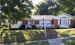 Spacious home that has been updated and remodeled several times. New roof 2003, furnance and heatpump 2010, handicap ramp from carport to den. Large dining room that accomodates oversized table, fireplace in LR w/gas logs and lots of crown molding,