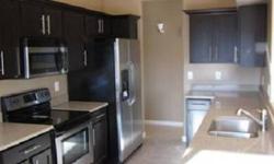 Complete remodel & is move in ready! All new fixtures in the kitchen and bathrooms, new cabinets, plumbing, granite quartz countertops, new stainless steel appliances including refrigerator. Brand new 20'' tile everywhere except new carpet in the