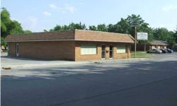 $140,000. Commercial property for sale in Dayton, TN. Corner lot- Own this bldg and have 2 rentals for offices. Great visibility, each side has seperate entrances and baths or use entire 2501 sq. ft. for your business, new C/H/A 4 years ago (practically