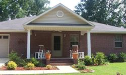 This home was built in 2006 it has 1575 square feet heated with a single car garage, porch, deck and outside storage building all on one acre of land. The home is very energy efficient. It is brick and vinyl on the outside. It has two very large bedrooms