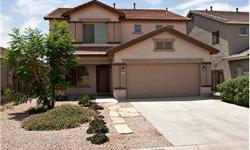 Spacious 5 bedroom 2.5 bath San Tan Valley Home. This Fulton built beauty sits directly across from a large community park and features gorgeous hard wood floors throughout most of the first floor with a 6th bedroom that could be used as an office. This 5