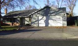 This Hermiston home has a great floor plan, 3 bedroom 2 bathrooms, living room, family room, utility room and a 2 car garage. The kitchen is large with a breakfast counter. The spacious backyard is fenced and includes a tool shed, dog run, and covered