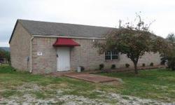 Solid 1,800 square foot brick office building with 8 interior offices, manager office, reception, and large storage room. 260 feet of Hwy 62 frontage which has heavy traffic. Would be great for small business, telemarketing operation, light industrial.