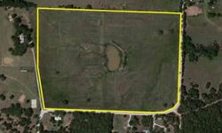 Located just north of Callisburg and west of Fm678, this 33.63 acre tract of land offers road frontage on two sides and access to city water. The acreage is currently used for hay production, so it has good grass, a nice sized stock pond and sandy loam