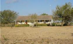 15 ac. 3/2 split floorplan home has a large living room & dining room, kitchen w/breakfast area, spacious utility/craft room. There is a full length covered front porch to enjoy your evenings. The property is nice level acreage w/ 1 drought resistant