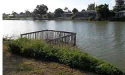 Excellent opportunity to own a lake front pool home in Venice Gardens. A/C is not functioning but intact. Pool Pump is missing, but appears that the rest of the pool equipment is intact. Sold AS IS.