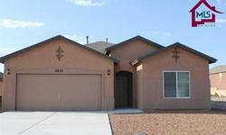 This brand new home is located on a nice cul-de-sac on 2808 San Lorenzo Ct. in Las Cruces, New Mexico and is close to Interstate access, shopping and schools. It has an open floor plan with vaulted ceilings, lots of ceramic tile, refrigerated air,