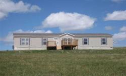 This manufactured home has a good floor plan and a great view of the Big Horns. The front porch/deck was just totally replaced. Buyer must provide a letter of loan approval from Bank of America with any offer.
Listing originally posted at http