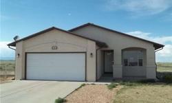 Gorgeous Pueblo West rancher! This home is move in ready. Large living room, wood floors along the main walking area, kitchen that opens into dining area, nice spot for a wood burning stove. Master bed with attached full bath, 2 more beds and another full