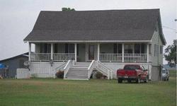 Great family, retirement, or hunting/fishing retreat. 1.78 acres land. 4 bedroom-2 bath two story home. Built in 1996. Road to road lot. Ample additional storage on 1144 sq ft ground level basement with sliding garage door entry. Jacuzzi tub in master