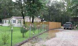5 bed/3 bath manufactured home on 2.786 ac m/l. Bordered on back & 1 side by Forestry Land. Fenced & cross fenced, landscaped, RV port, 24x30x14 shop on slab, whole house generator, double paned vinyl windows, seperate tub & shower mstr bath, Jack & Jill