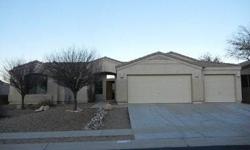 Lovely 4 BD/2BA HUD home in desirable neighborhood in Oro Valley. Open floorplan, spacious kitchen. Built in shelving in living room. Large covered patio and 3 car garage. There's even a pool and kiva fireplace for outdoor entertaining! Lots of room for