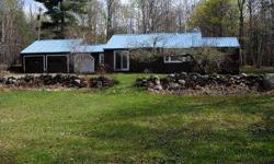 SOUTH HILL CHARM Charming cottage on 2+/- acres has a large lawn, stone walls and wooded mountain views. Three bedrooms plus bonus room. Interior features include wide board wood floors, gas fire view stove in living room and new bathroom. Two car