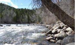 114 feet of hard to come by Poudre River frontage. Great building site with Well,Septic and RV hook-ups ready to go. Almost a half acre of flat land with views in every direction of the majestic mountains. Fish from you back door in one of the best