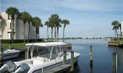 Great 2 bedroom condo with fabulous river views, DOCKAGE, & OCEAN ACCESS in a beautiful riverfront boating community. Truly Florida living at its best with all amenities, including beautiful clubhouse with social room, library/card & billiards room,