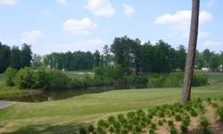 Less than $150,000 for this lot with incredible golf and water views! Overlooks 11th green of Blue Heron course w/stunning views of both 11th & 12th holes. Situated at the end of cul-de-sac on over 1/2 acre, very private. NO 3% development fee.Listing