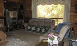 Master bedroom with balcony and staircase, marble counter top with double sinks, and big shower. Fans throughout the house. Family room are wood sides and ceiling. This home has space for office. Fireplace made of rock. 10 x 20 storage shed and fruit