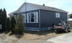 2+2 bedrooms, double lot, new windows, roof, central air, garage, shed,appliances also available with house. tel