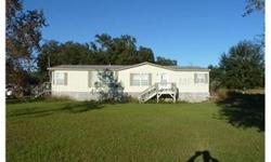 Looking for A Lot Of Land and Peaceful Living? This Is It! Beautiful 12.2 Acre Property with 2 Homes! 1st Home Feautes 3 bedrooms 2 Baths, Screaned Porch and Utility Shed. 2nd Home Features 1 Bed 1 Bath with an Additional 1 Bed 1 Bath in Building Behind