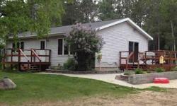 Adorable rambler nested in on 7 1/2 wooded acres that adjoins 100's of acres of government land for great hunting. Nice open floor plan w/sliding doors to deck off dining. Lower level family room could be partitioned and add egress window to add a 3rd