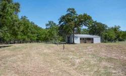 Hill country living at its finest, this uniquely secluded eleven acre tract offers a nice balance of open land, towering hardwoods, and an abundance of wildlife off a private road.