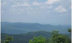 Property is approx. 450' wide on county maintained road (Monument Rd.), approx.1250 feet deep. Can see Amicalola Falls Lodge in the distance, long range 180 degree views. Being on a ridgeline allows you to see SUNRISE and SUNSET- at approx. 3000' above