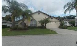 Short Sale. Expansive lake view from most windows. Well cared for home with open floorplan, charming foyer and enclosed lanai on a quiet street. Not far from the new Manatee Charter school!