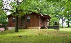 House with 35 acres. Tremendous road frontage. Nice house with full basement, deck, city water & two shops. Property approx. half open, half wooded. In rural area minutes from Tennessee River.Listing originally posted at http