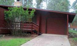 CHARMING CABIN WITH LOADS OF CURB APPEAL. CARPORT HAS GARAGE DOOR FRONT. KNOTTY PINE PANELING, HANDSOME FIREPLACE, 2 A/C UNITS. ATTRACTIVE KITCHEN WITH FAIRLY NEW APPLIANCES, FENCED BACK YARD.Listing originally posted at http