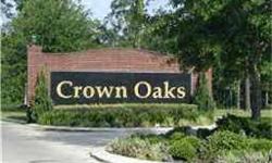 Heavily wooded 5 acre lot in gated community of Crown Oaks backs to a private ranch. LOW TAX RATE! Deed restrictions, but horse friendly, one per acre. Easy commute to The Woodlands, Montgomery, Magnolia or Conroe. One of the nicest large tracts left!