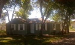 Completely remodeled, new kitchen, bath, flooring, heating, windows, roof, paint , and counter tops. You can live ona half acre with some of those 4H ANIMALS. The house next door has a couple possibilities as a scraper or a fixer upper but the drive way