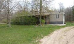 This lovely home has lots of potential. Perfect for your family! Situated on 30+ acres with large garage in the back. Make this your dream property! Seller financing is offered with no minimum credit score requirement! Contact Drew at 866-847-5738 to