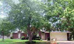 Charming brick 3 bedroom home with split bedrooms, new roof, paint, floors, 15 Seer HVAC. Incredible kitchen with granite countertops and gorgeous tile backsplash in kitchen. Beautiful trees and landscaping in front flower beds. No City Tax, Only carpet