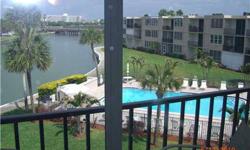 You will fall in love - views - layout - community - you have it all. Waterfront 2/2 Condo Bay Island W/Beautiful Water views.Central heat & air 2010 (under warranty); Stackable washer/dryer in on of the bathrooms. Six POOLS, 2 jacuzzis, lighted tennis