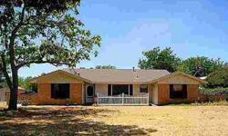 COUNTRY LIVING in city limits! 3-2-2 one-story brick with fireplace and loads of updates including