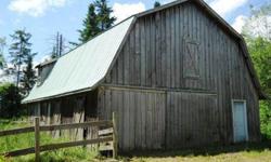 Estate sold in AS IS condition. Welcome to the country cottage tucked away in the woods! One bedroom plus a sleeping loft, natural light, fireplace, wrap around deck overlooking the pond, pasture and barn with 5 stalls and an apartment upstairs!! Barn has