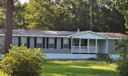 Barely lived in home on 1.5 acres in a country setting. Master bath features a huge walk in closet with a seperate shower and whirlpool tub! Huge Kitchen with lots of counter space and cabinets. Full dining room and large utility room. The yard is full of