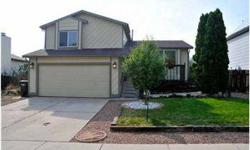 This very well cared for tri-level home boasts newer flooring, paint, kitchen cabinets, counter tops, light fixtures, hardware, appliances, vinyl windows, six panel doors, newer bathroom vanity, faucets, and flooring! CO Homefinder is showing this 3