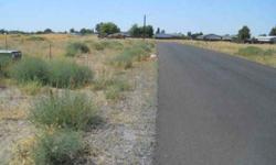 Buildable flat lot in Irrigon. City water and sewer. Street is paved. Sidewalks must be installed before occupancy. Manufactured home more than two (2) years old are not permitted. Steet lights.Listing originally posted at http