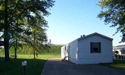 Three bedroom, two bath mobile home in Fehrenbacher Trailer court. 1280 square feet of living space, kitchen appliances included