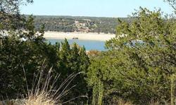 Buy this home site now while prices, interest rates, and Lake Travis water levels are low! Enjoy panoramic hill country and lake views off your future 2nd story porch or raised deck. Enjoy all the amenities here in this secure golf course community.
