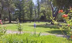 This premier central Atherton address, less than 1 mile from the prestigious Menlo Circus Club, spans approximately 2.54 level acres of beautiful land. The site with original home, significant trees, and sun-swept open spaces is surrounded by estate