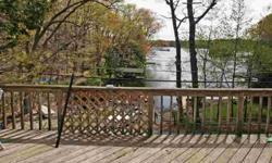 Fantastic Cranberry Lake location! Gorgeous lake views from this multi-level home set directly across from boat launch ramp,dock space & play ground. Sit out on your deck, barbeque, watch the activities on the lake and enjoy the beautiful sunsets. Perfect