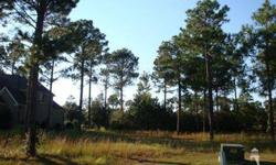 This breathtaking home-site along the 4th fairway of Carolina National is located on a private cul-de-sac in Winding River Plantation. To the left you can see to the green and beyond to the Marsh Savannahs of the Lockwood Folly River and to the right