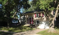 Completly remodeled 3 bedroom 1250 square foot on a nice street in southeast Iowa City. New solid hardwood floors, carpet, tile, windows, doors, kitchen cabinets, countertop, fixtures, railings, dishwasher, microwave...pretty much everything is new. This