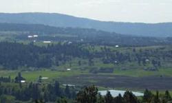 Glorious views to south, west and northwest - sunsets!! Level building site (it's deceptive) - trees and ground cover. Paved road, near Liberty Lake. 22 minutes to downtown Spokane - 10 minutes to shopping - high end homes, specatular area.
Listing